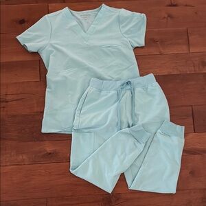 Mandala scrub set XSP joggers and XS one pocket top in Aqua